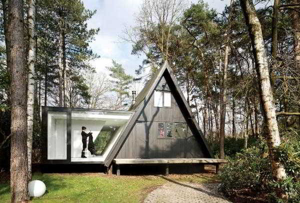 	Дом-шалаш – оригинальный вариант загородной постройки и необычная альтернатива стандартным дачным домикам				