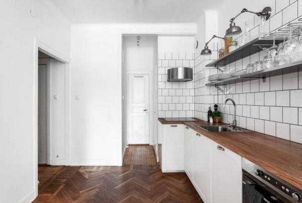Интерьер квартиры-студии в скандинавском стиле: спальня, кухня, гостиная на 32 метрах